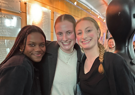 Addy with host sisters at orchestra